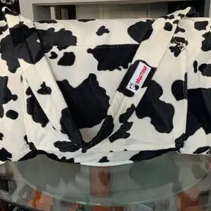 Cow faux fur bag