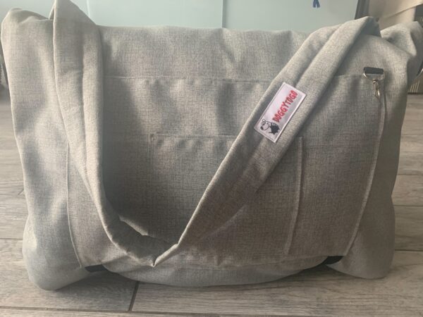 An enlarged image of a grey color bed bag