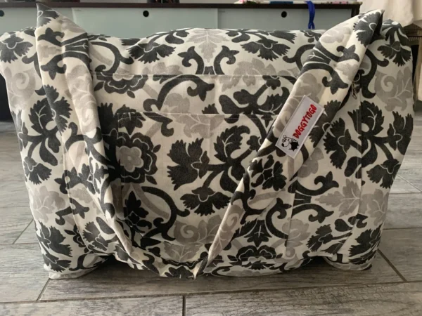 A small aspect ratio image of a dog bed bag